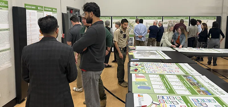 People looking at displays