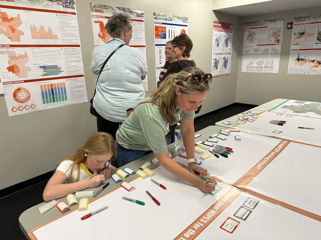 People interacting with displays